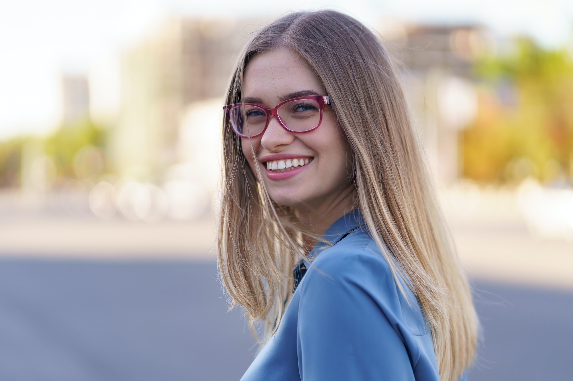 Portrait smiling woman in eyewear