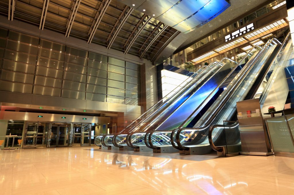 modern escalators in hall