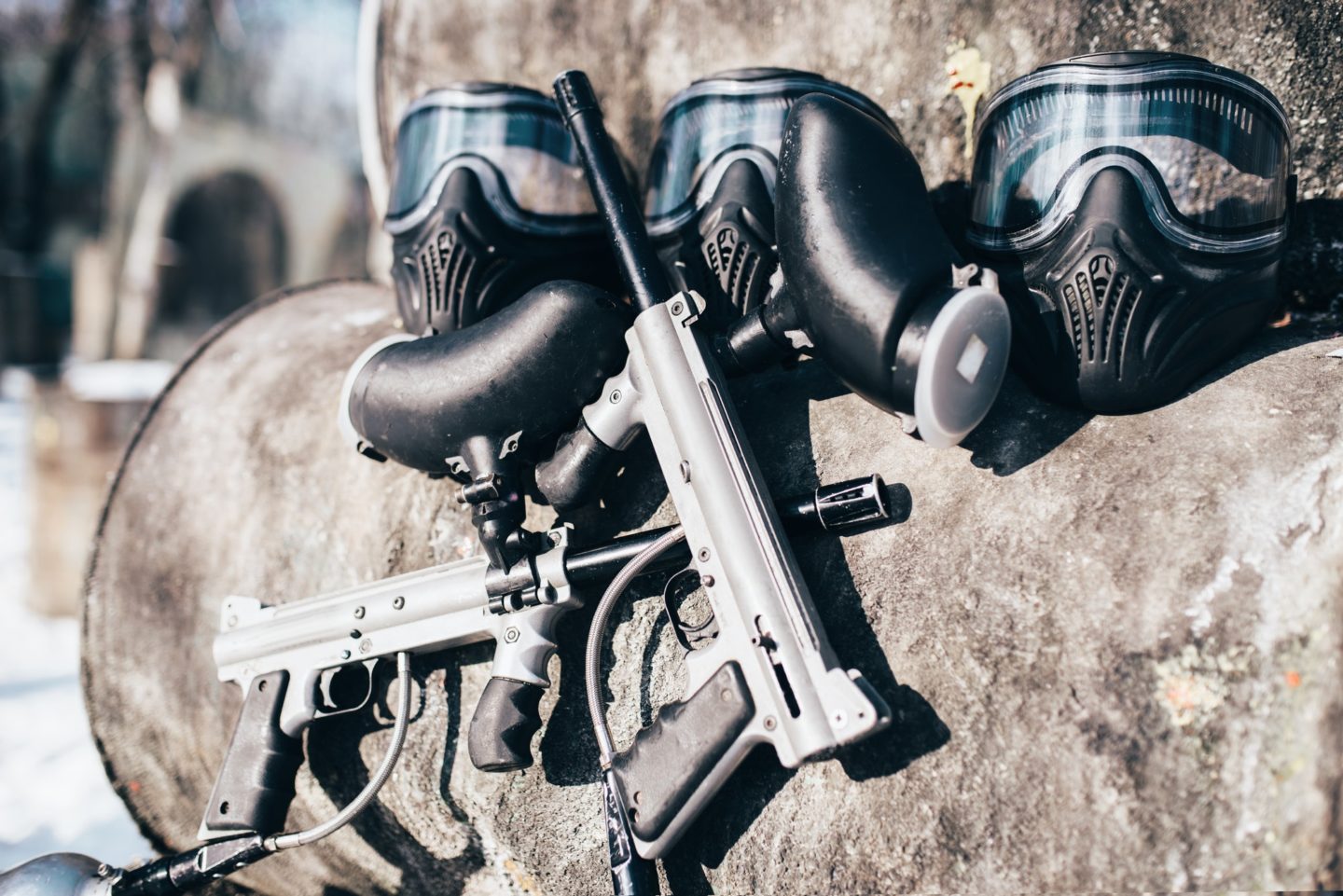 Paintball masks with glasses and marker guns