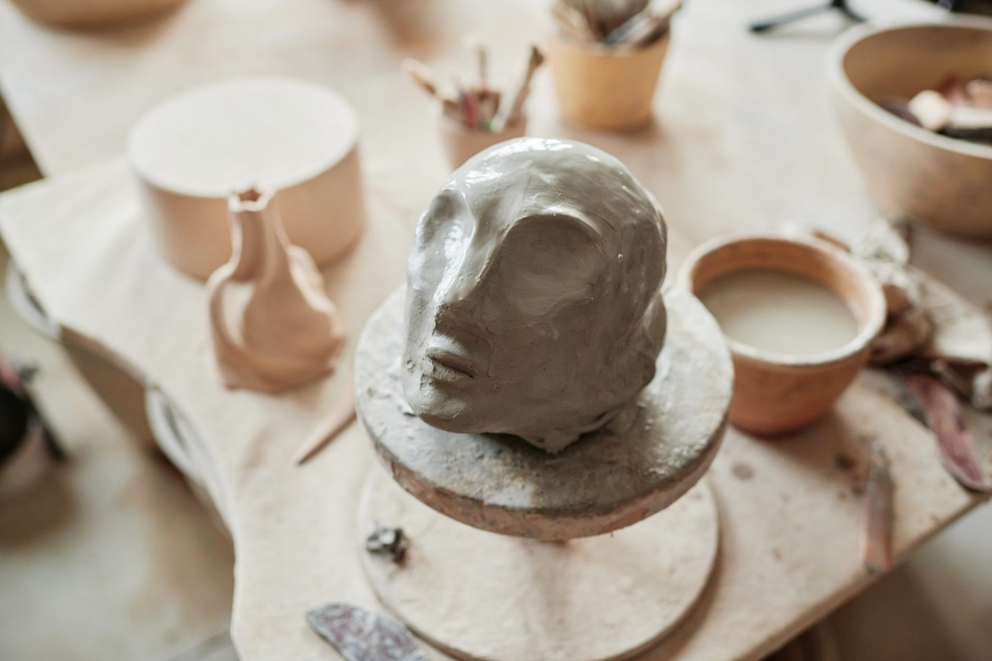Clay sculpture of human face