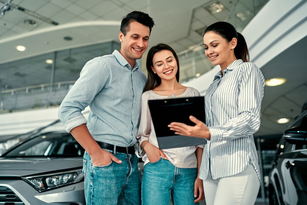 At a car dealership, buying a car