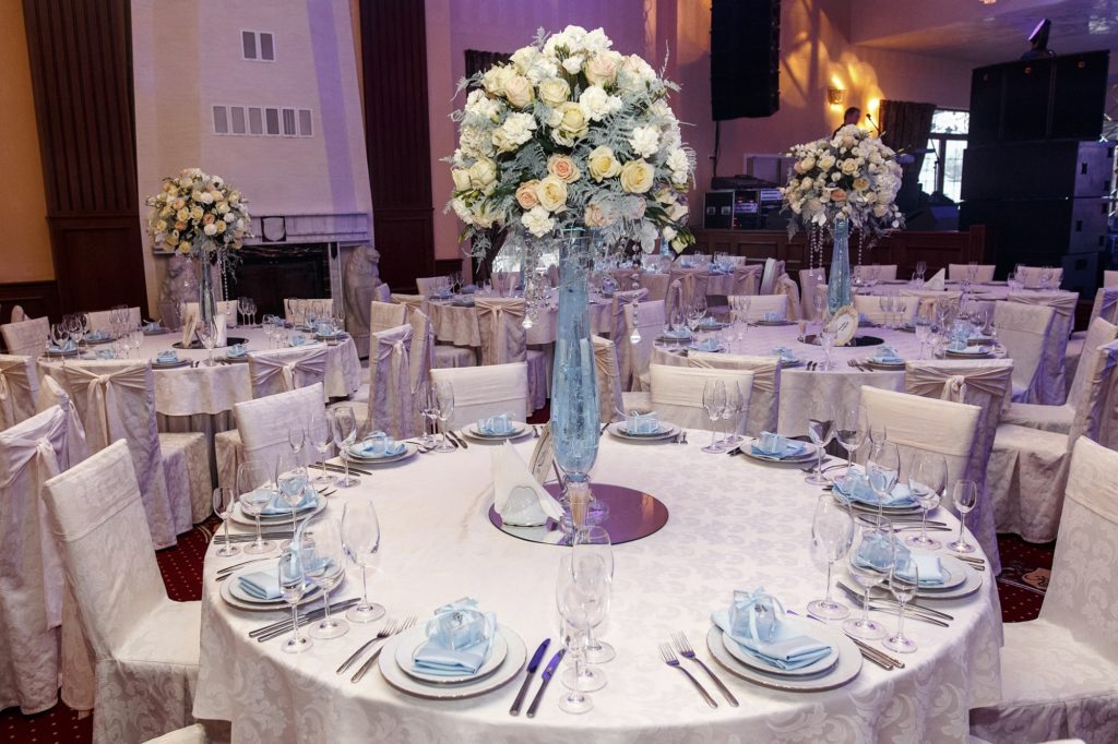 luxury decorated tables at rich wedding reception