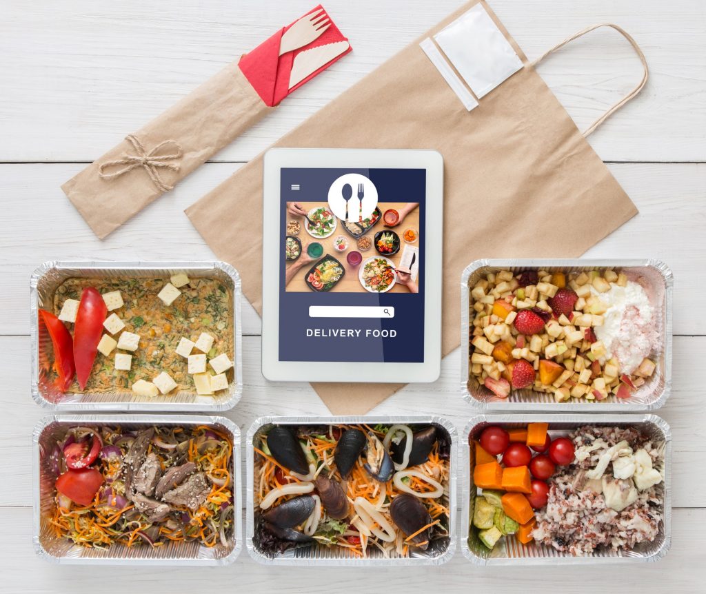 Vegetarian set in ecological packaging. Food with tofu, mussels and vegetables in containers