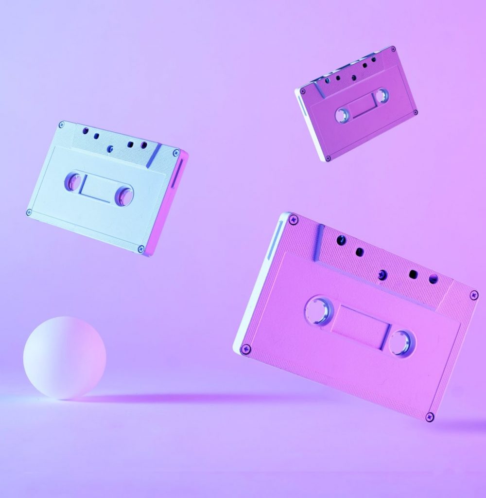 Artistic still life of floating audio cassettes