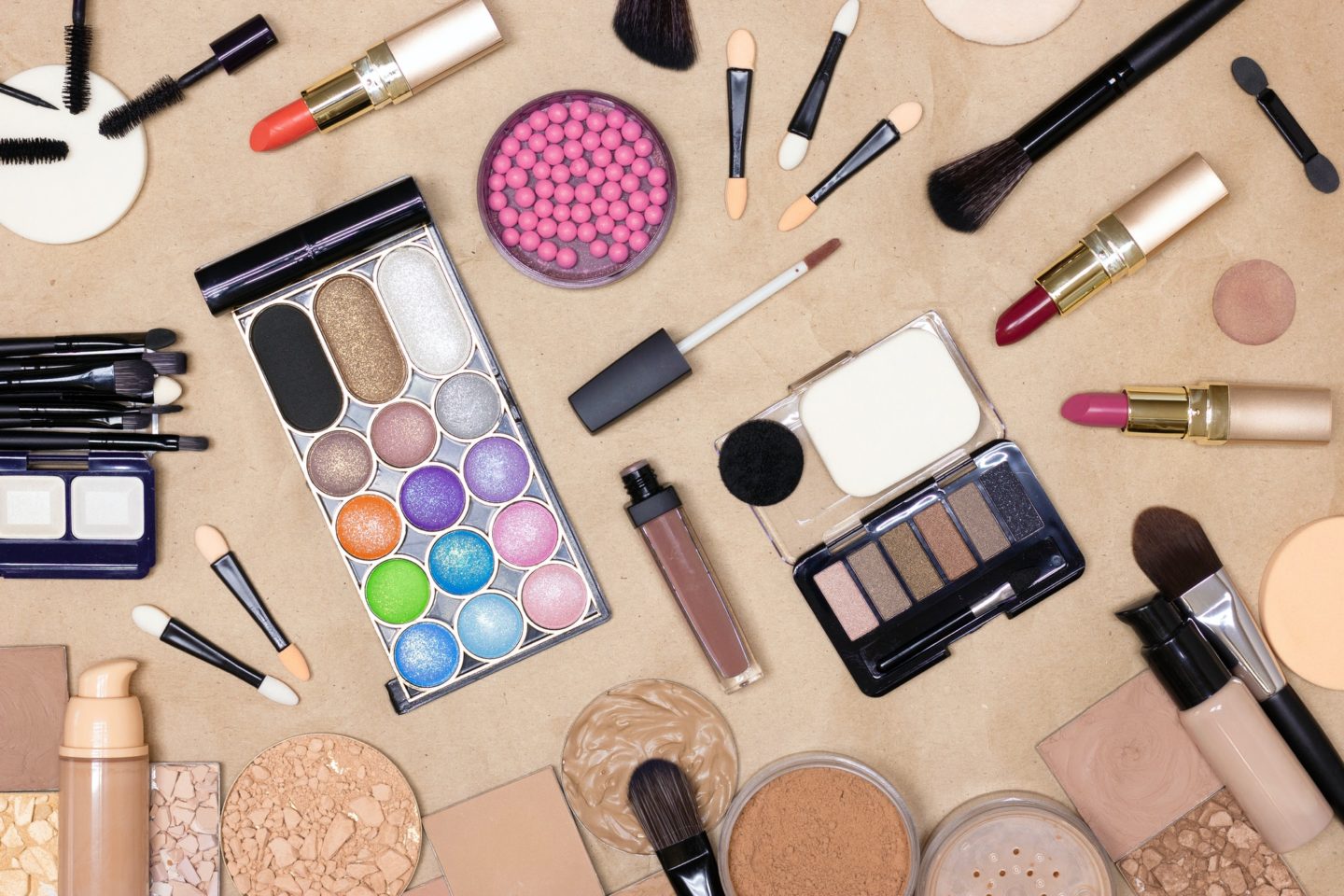 Makeup products and accessories on make-up table