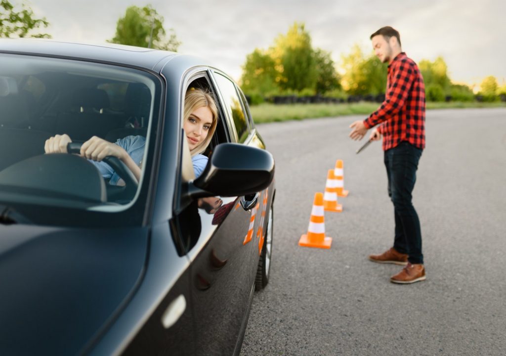 Male instructor happy with driving of his student
