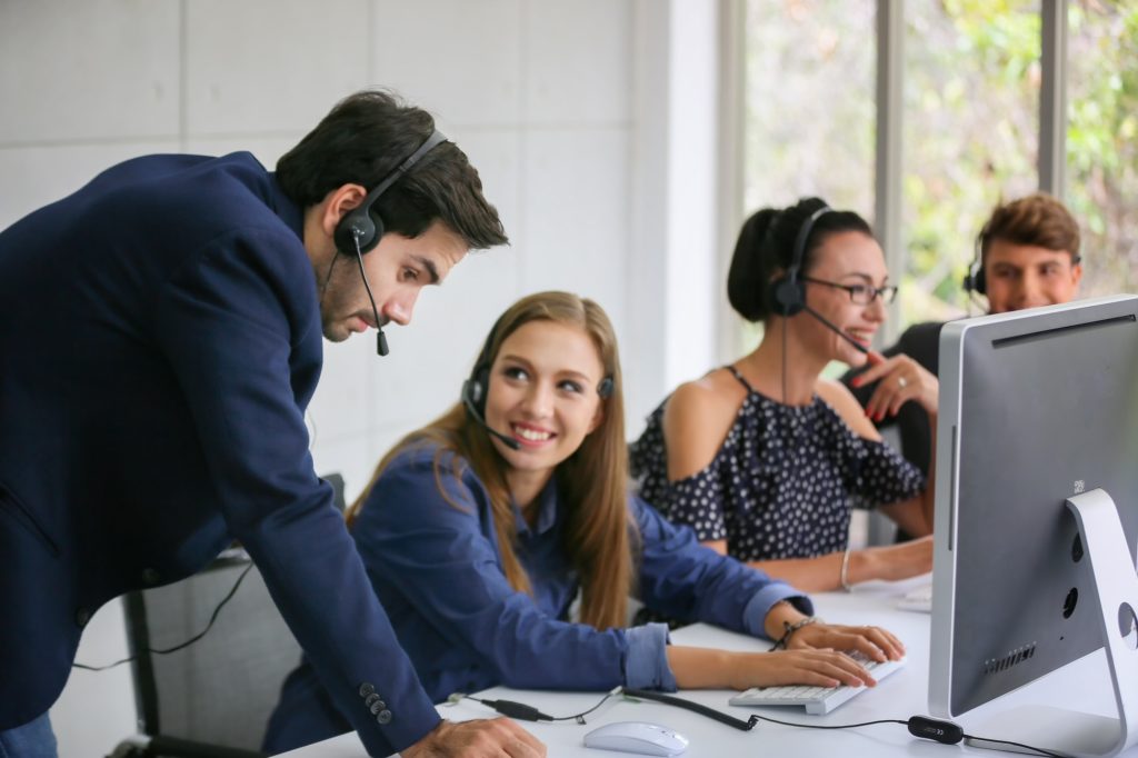 Online Support team in office.