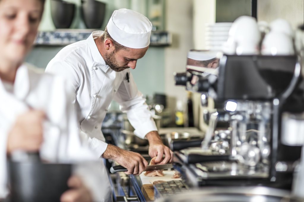 Chef preparing food in kitchen