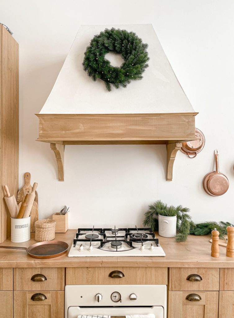 Festive christmas decorated kitchen counter with stove