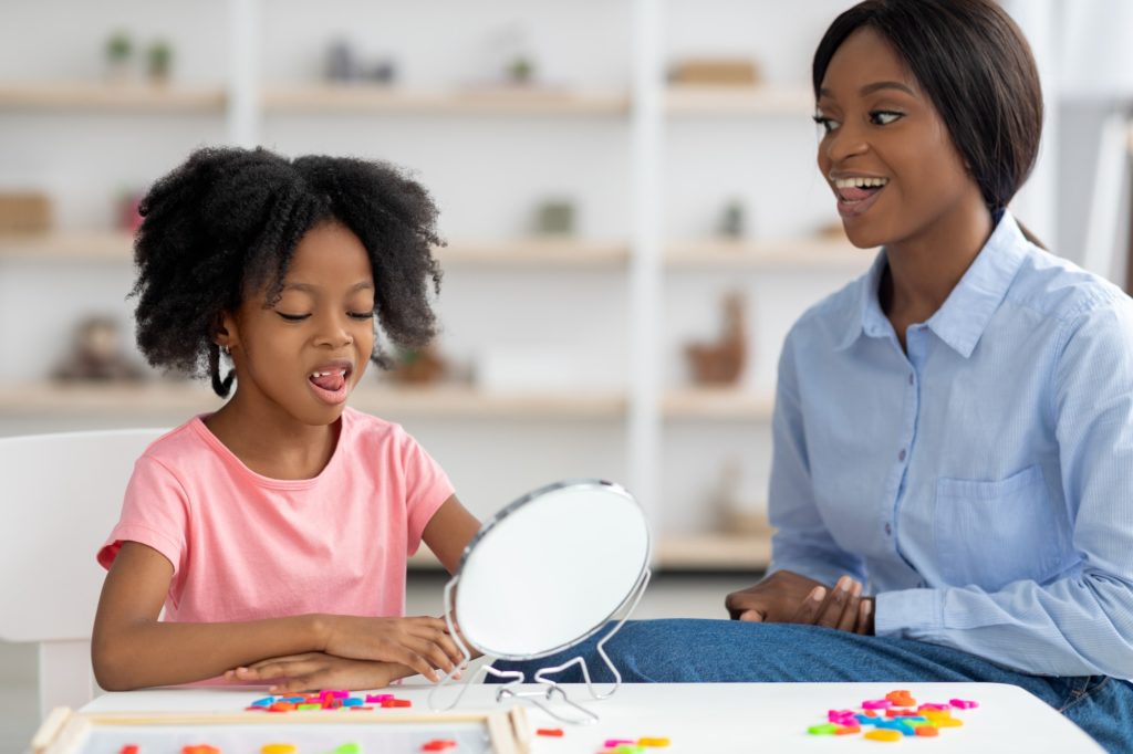 Kid with stuttering problem visiting speech-language therapist