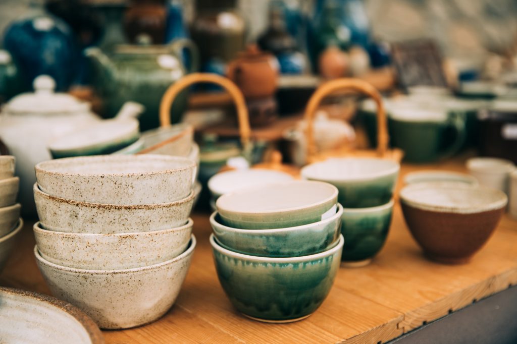 Ceramic Clay Crafts. Ceramic Dishware In Market. Bowls Of Differ