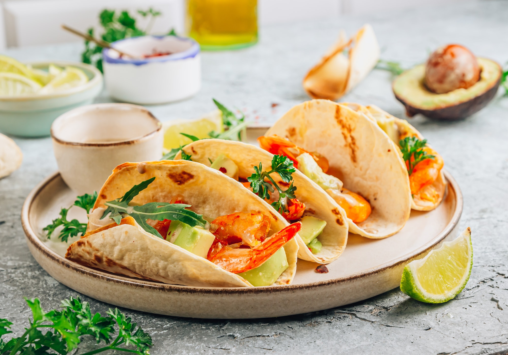 Diet healthy tacos with shrimps and avocado.