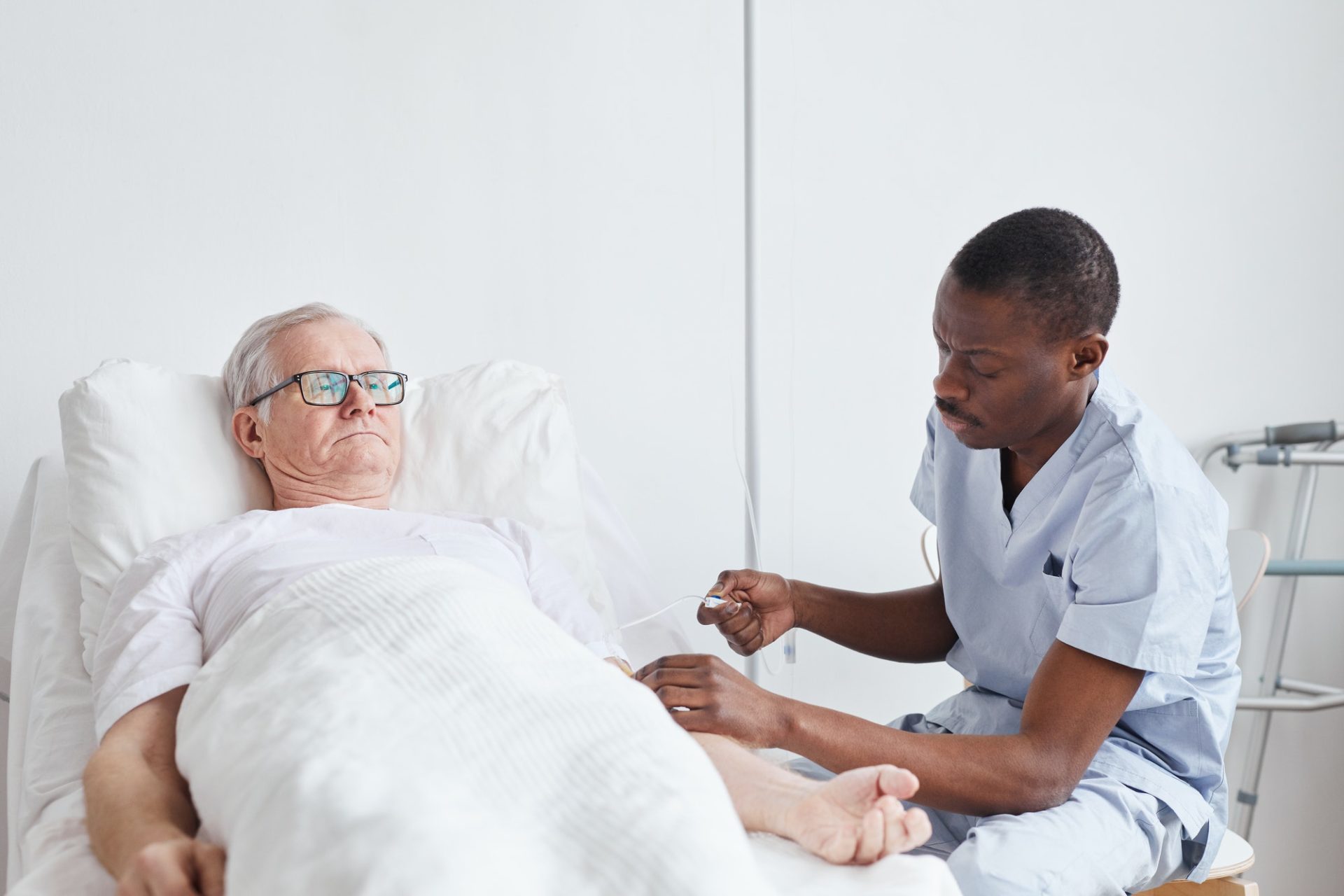 Male Nurse Caring for Patient