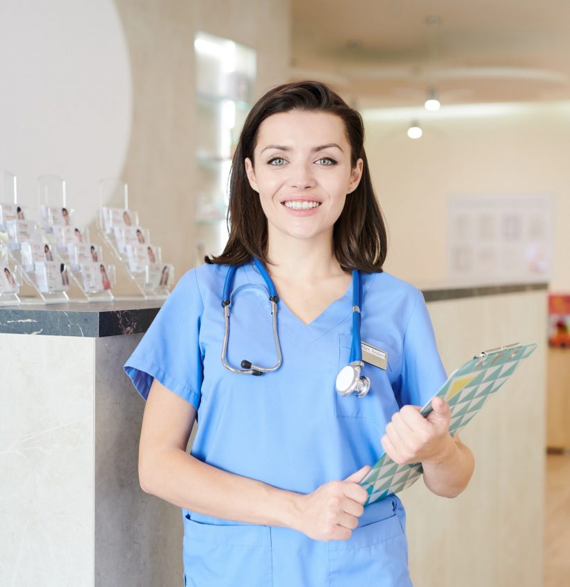Female Nurse Posing in Clinic