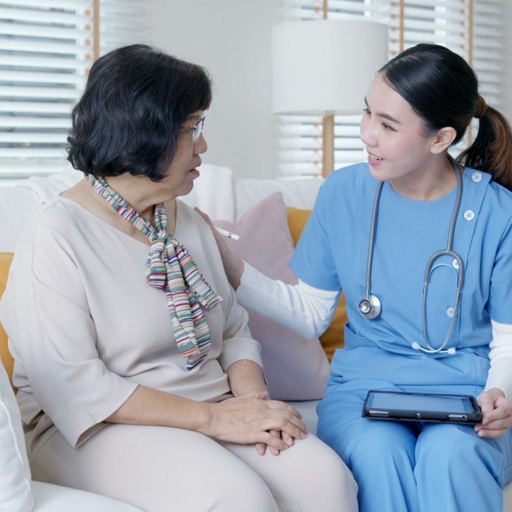Young asia female nurse, assisted living, in-home carer or doctor visit old senior