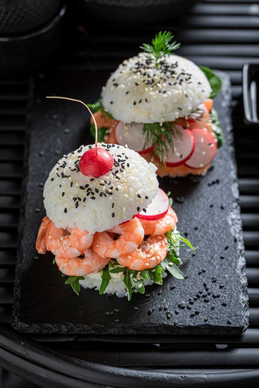 Healthy sush burger with seafood and vegetables as Japanese appetizers.