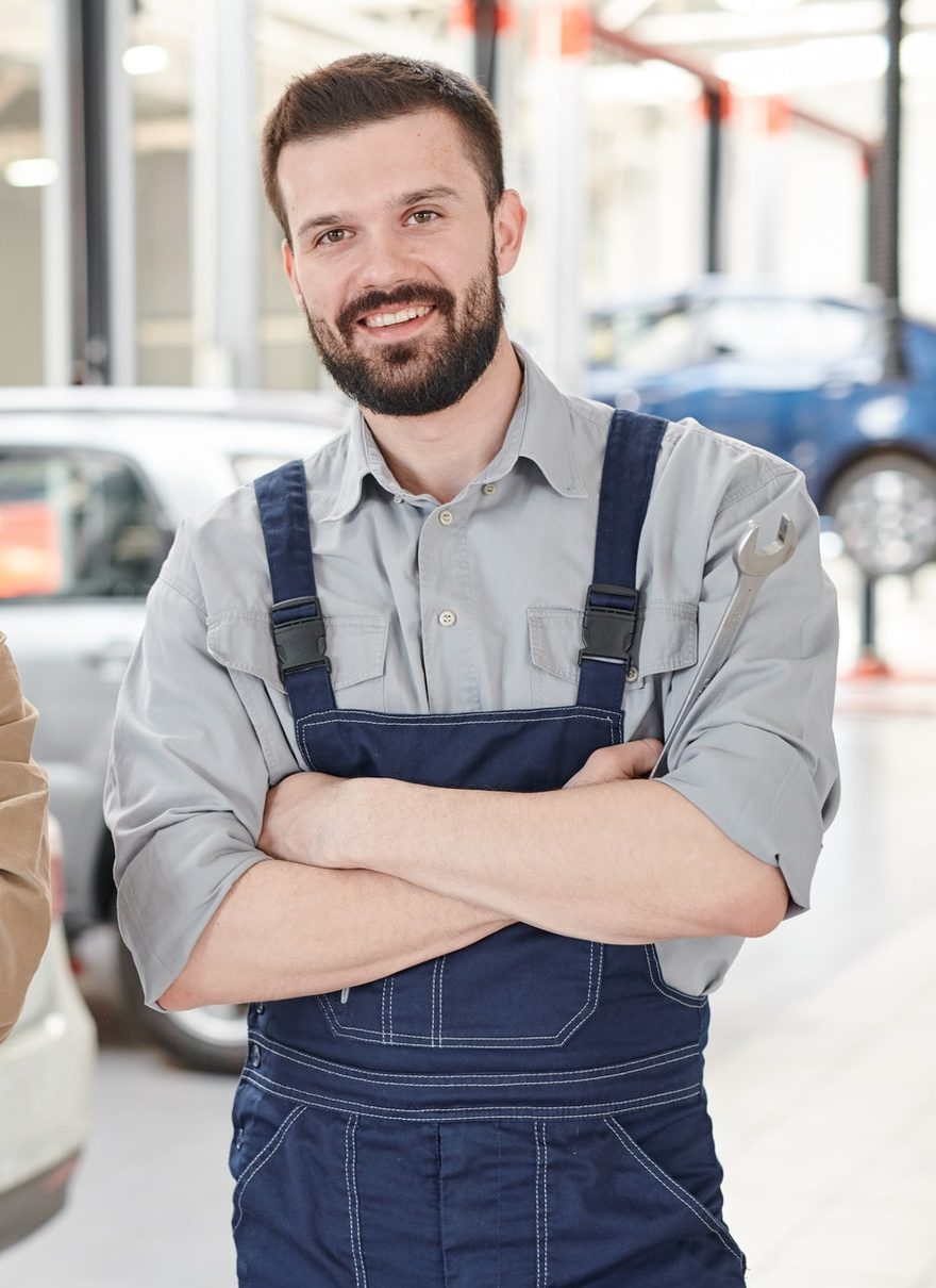 Two Workers Posing in Car Service