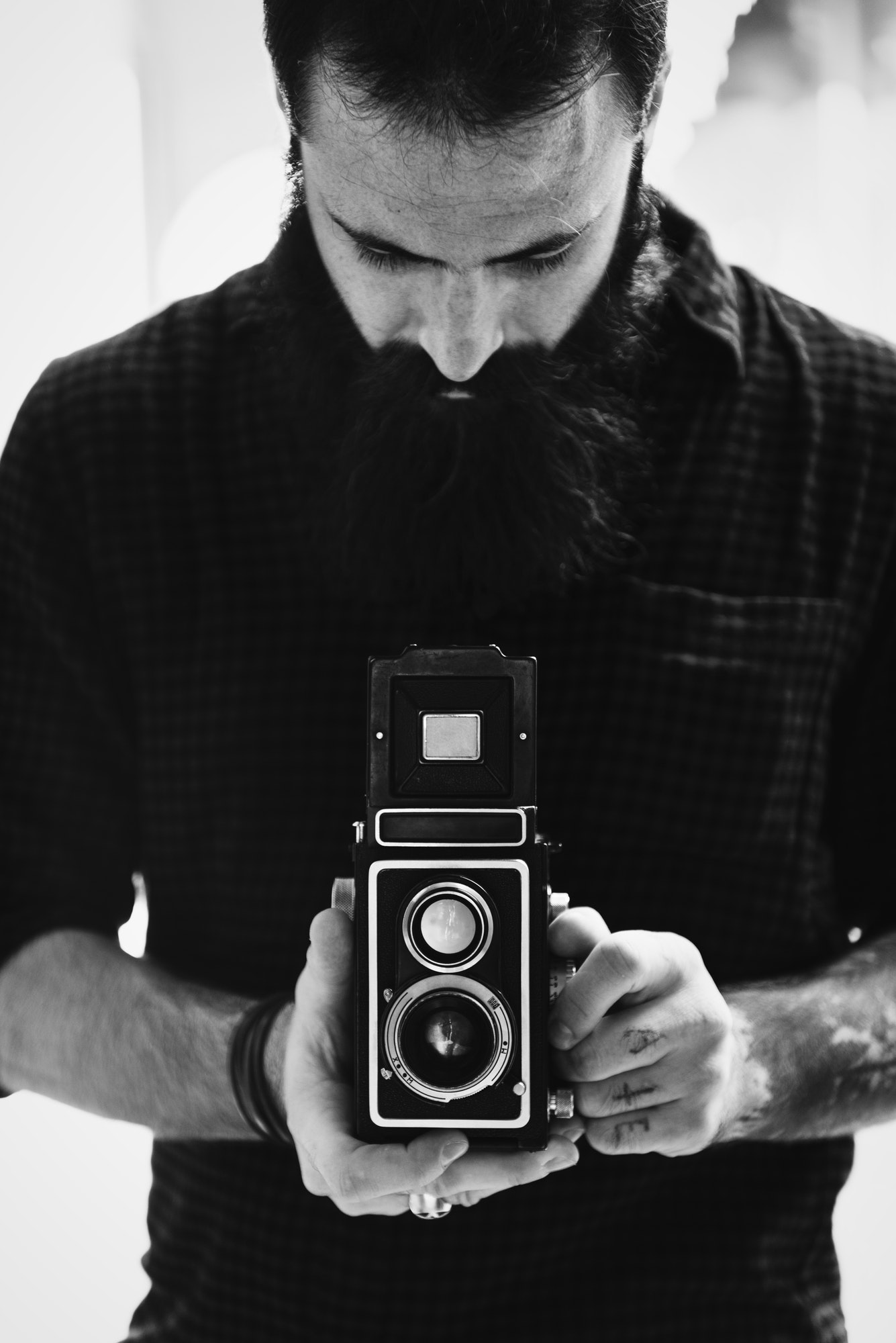 Photographer using a vintage camera