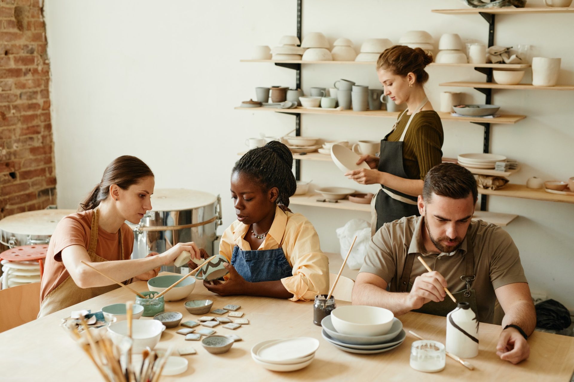Group of People in Pottery Workshop