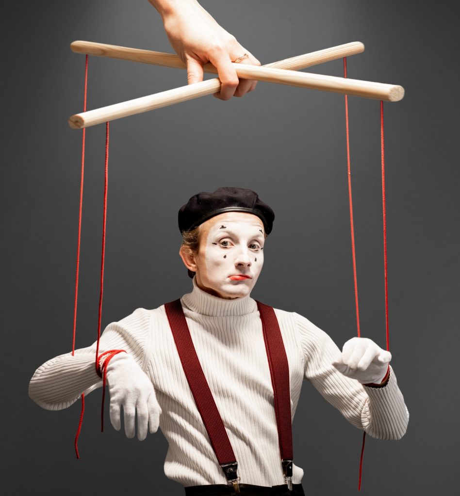 Marionette contolled by a hand