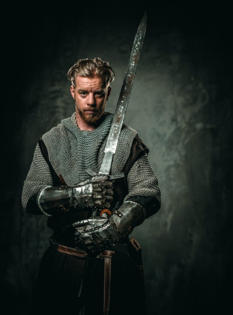 Medieval knight with sword and armour