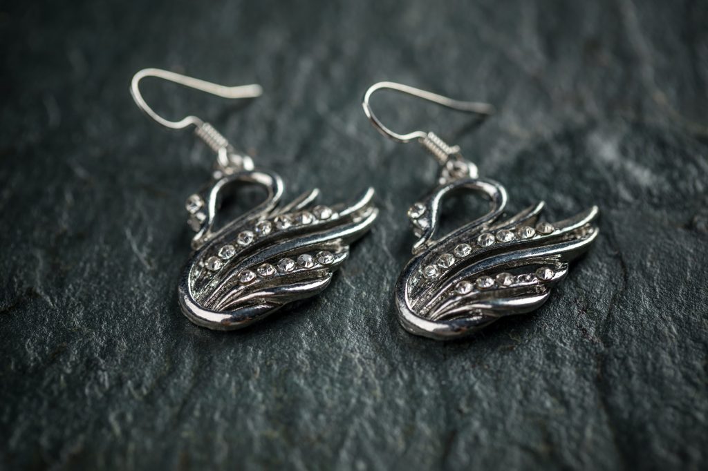 Swan shaped metal earrings