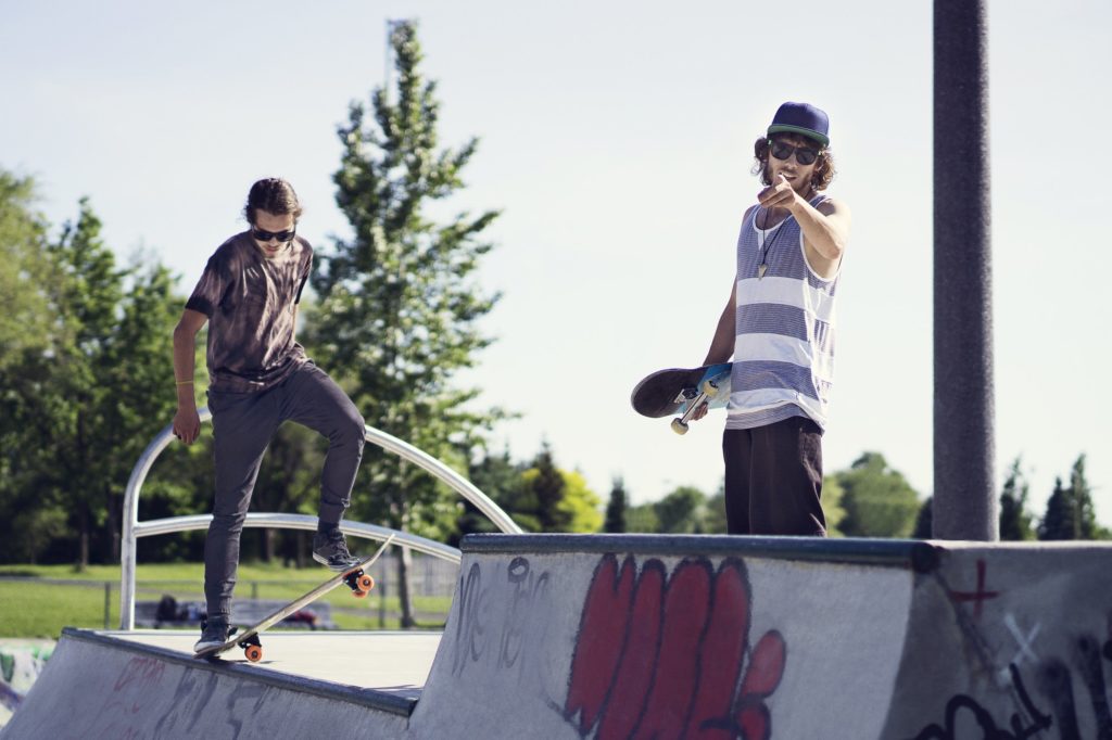 Young Skateboarders On Ramp