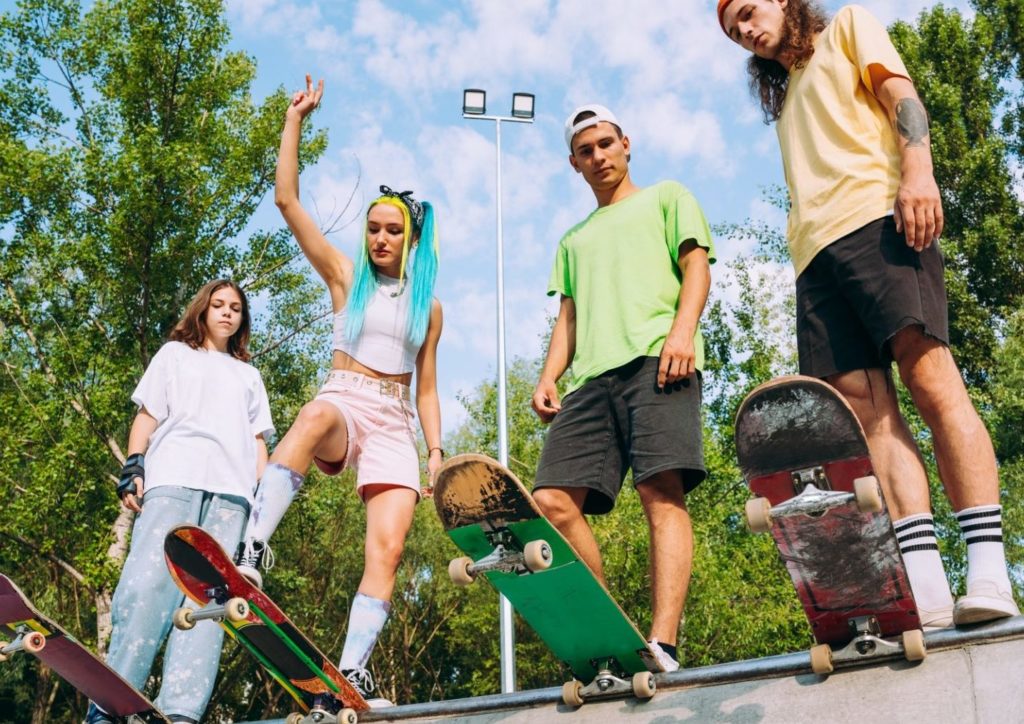 Group of professional skaters teens at the skatepark
