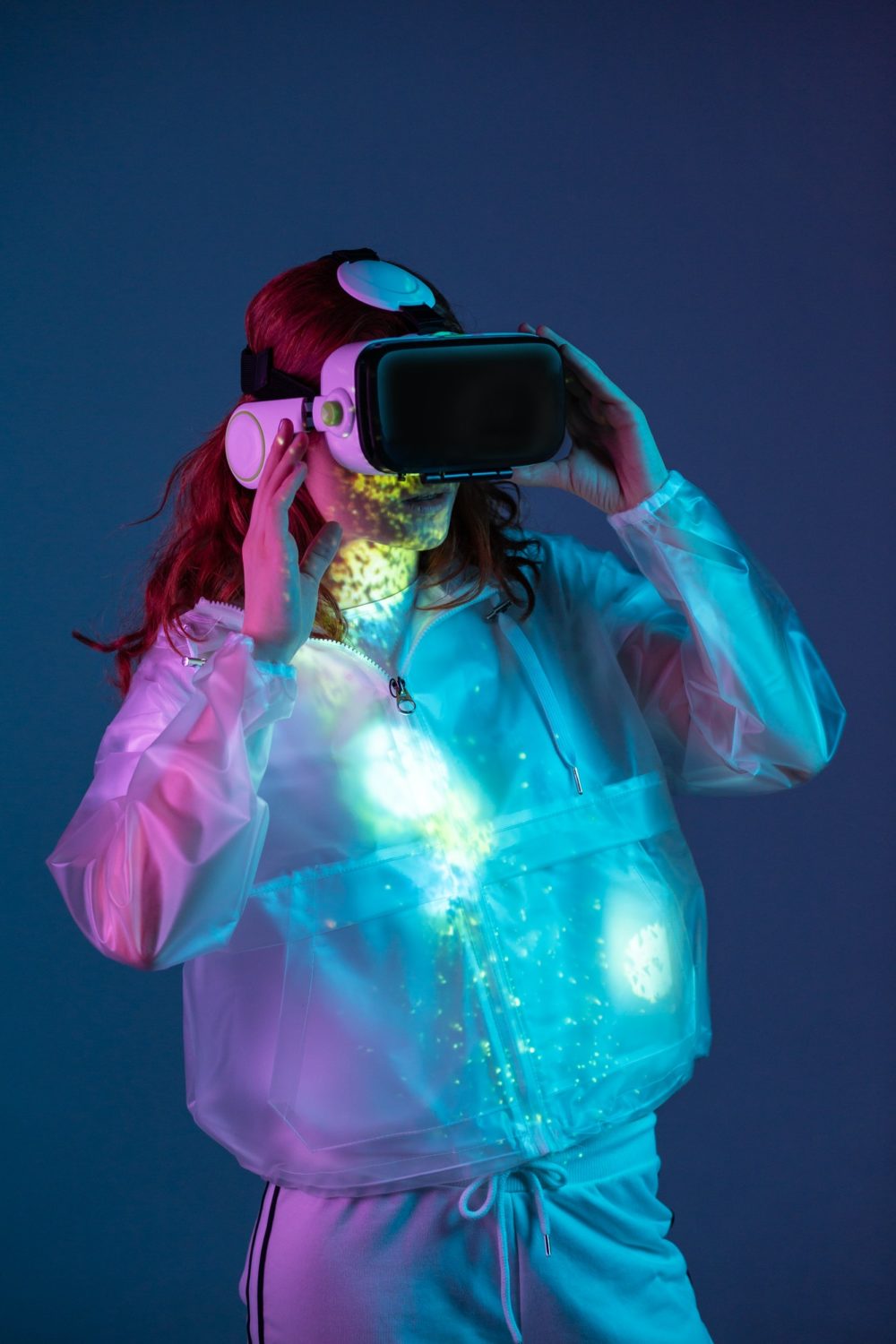 Woman touching air in VR glasses