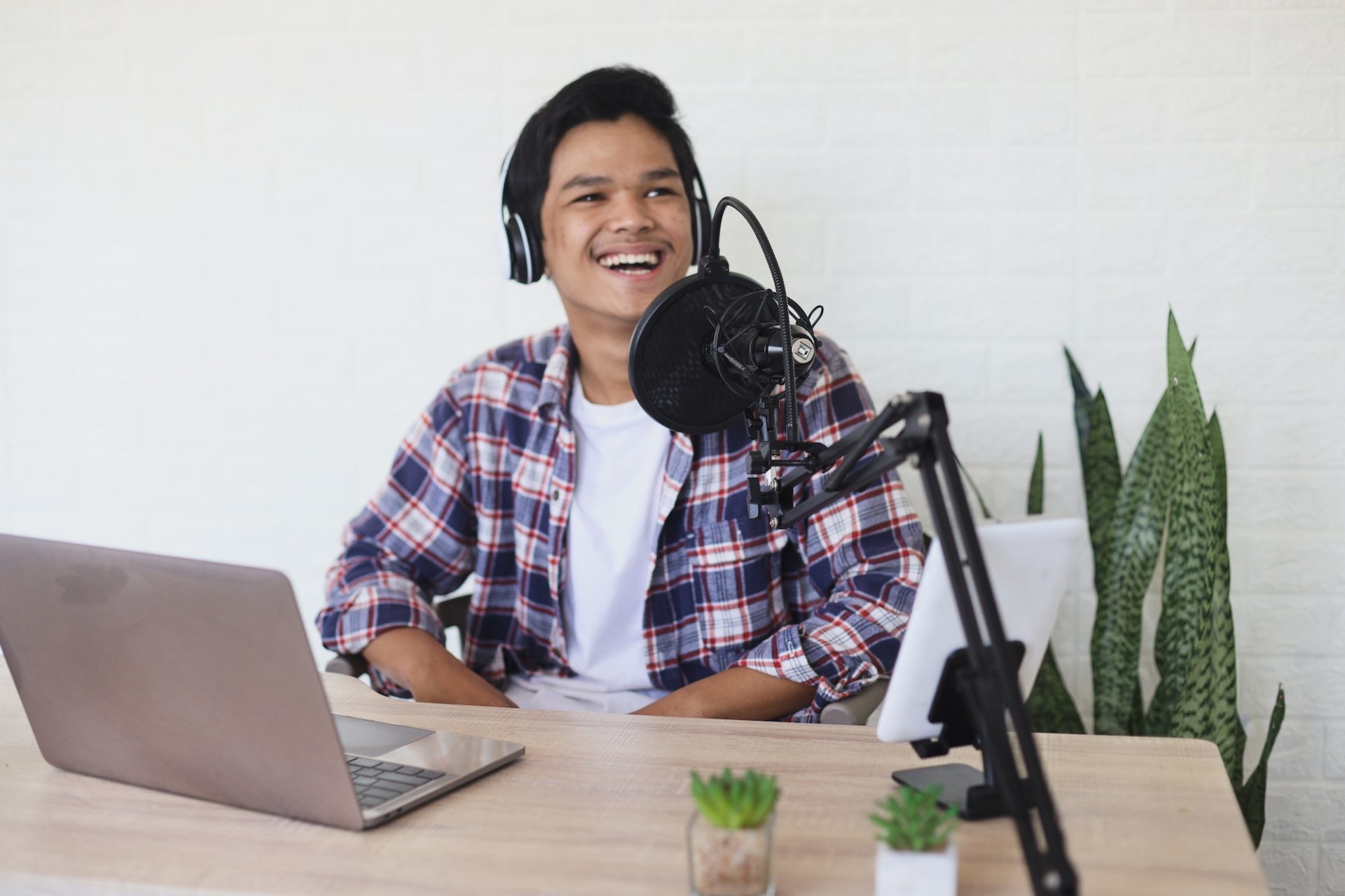 Young Asian man expression in podcast broadcasting