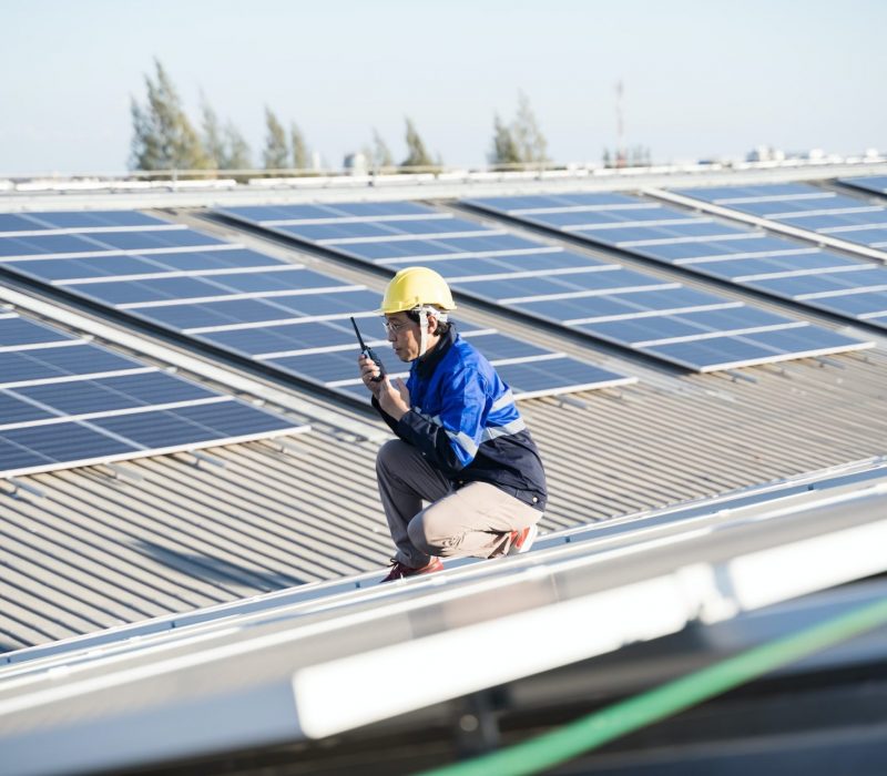 photovoltaic solar panels solar cells on roof top factory.