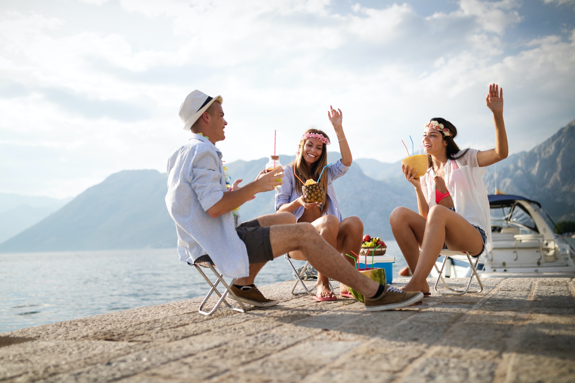Group of friends enjoying summer vacation. Summer, holidays, vacation and happiness concept