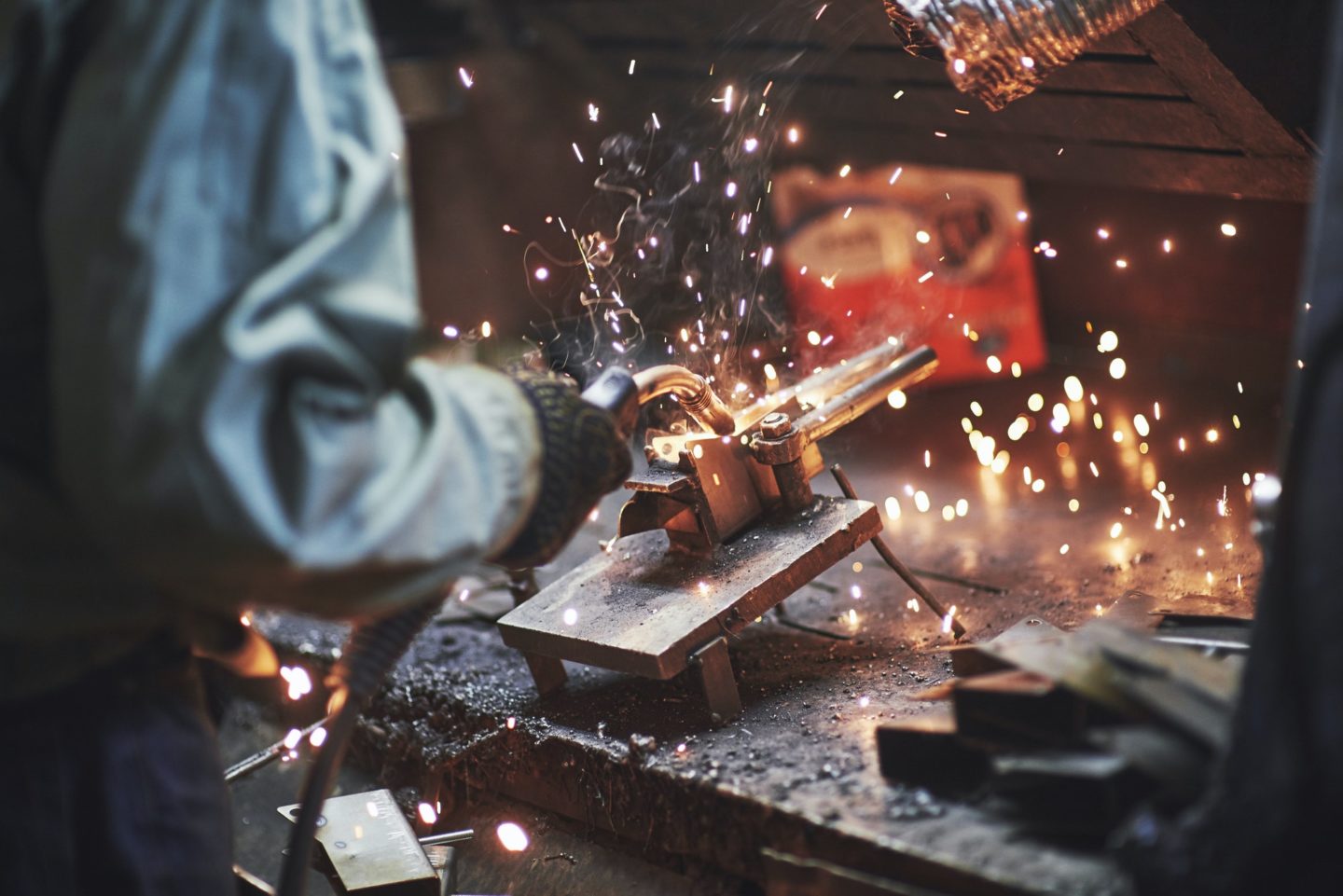 Industrial factory weld worker. Welding or welder master weld the steel