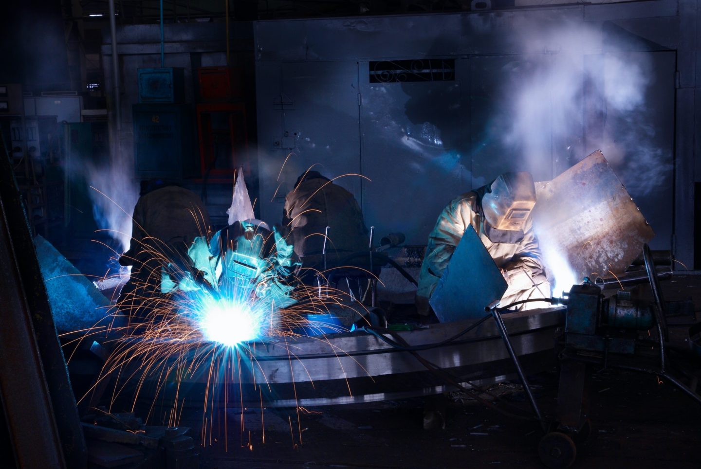 Welders working at the factory