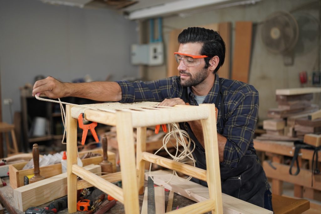 Carpenters Assembling Furniture